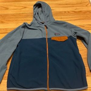 Blue zip up. Tag with size came off but guessing boys S/M?